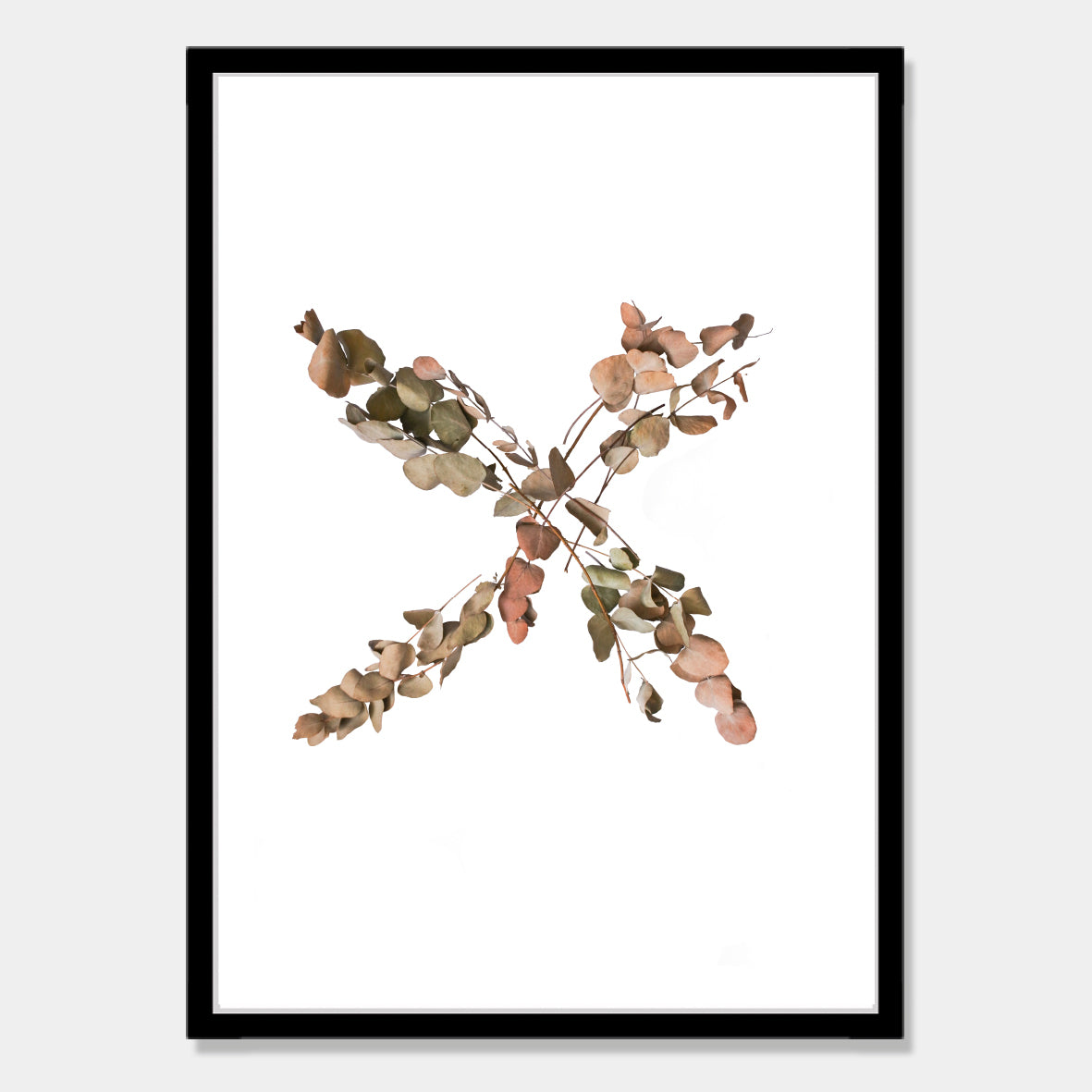 Photographic art print of dried leaves in a X shape by Bon Jung. Printed in New Zealand by endemicworld and framed in black.