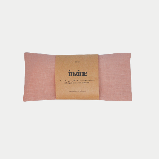 Handmade linen eye pillow in vintage blush, filled with organic chamomile and lavender and linseed.