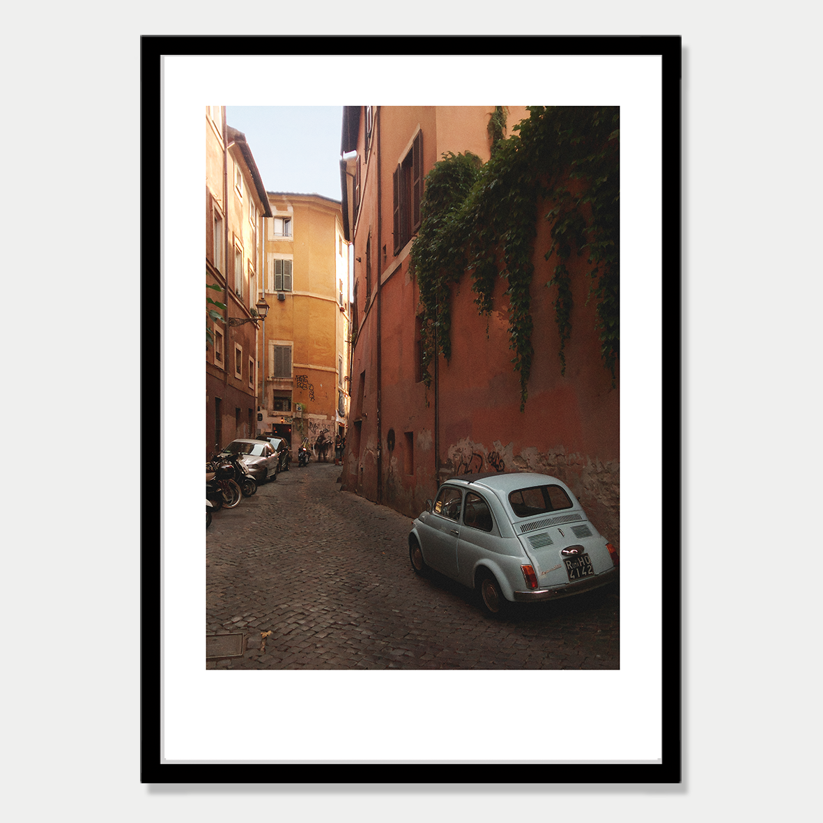 Little Car in a Backstreet of Trastavere, Rome Still Life Photographic Art Print in a Skinny Black Frame