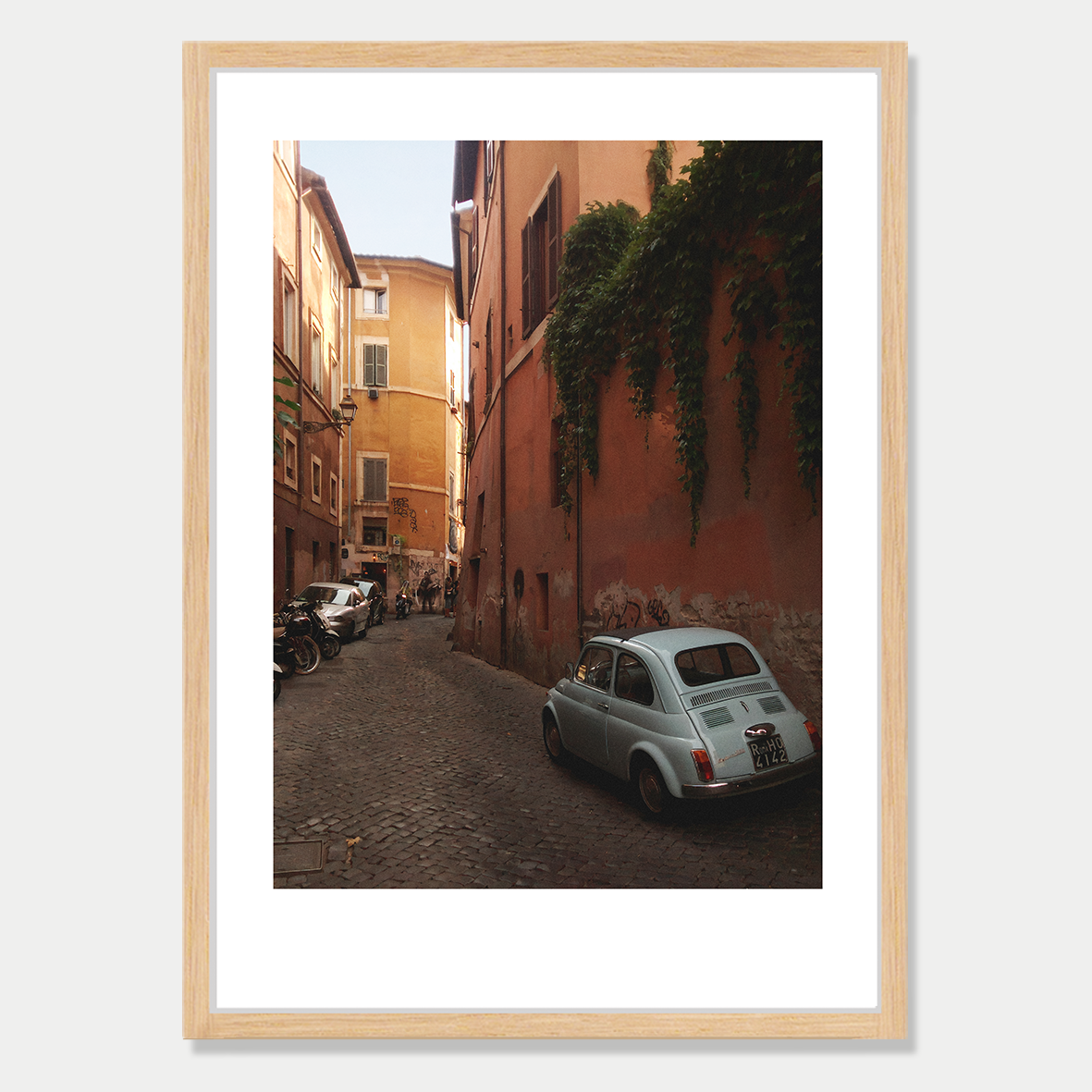 Little Car in a Backstreet of Trastavere, Rome Still Life Photographic Art Print in a Skinny Raw Frame