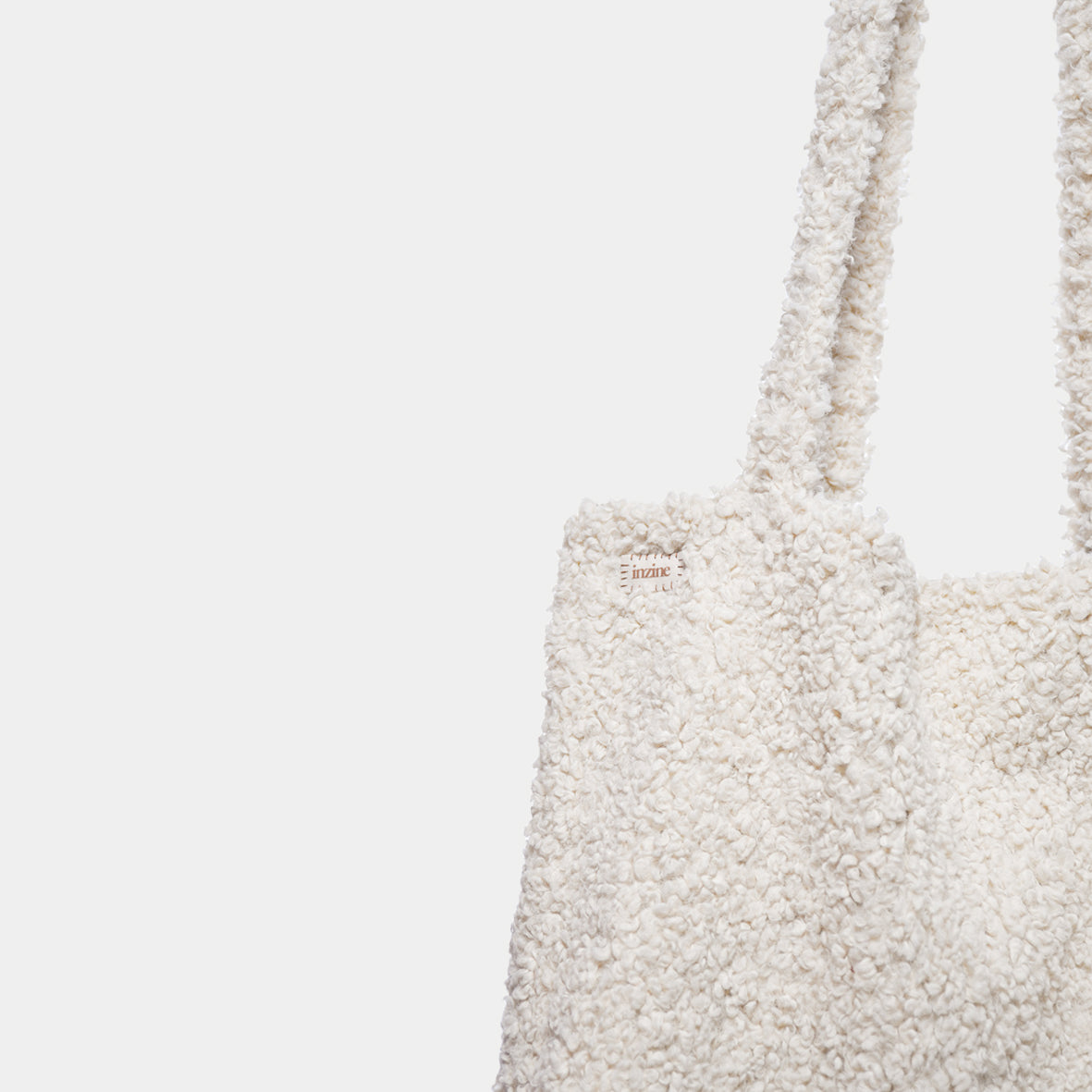 Teddy tote bag, off white colour with brown inzine label. Hand made in New Zealand.