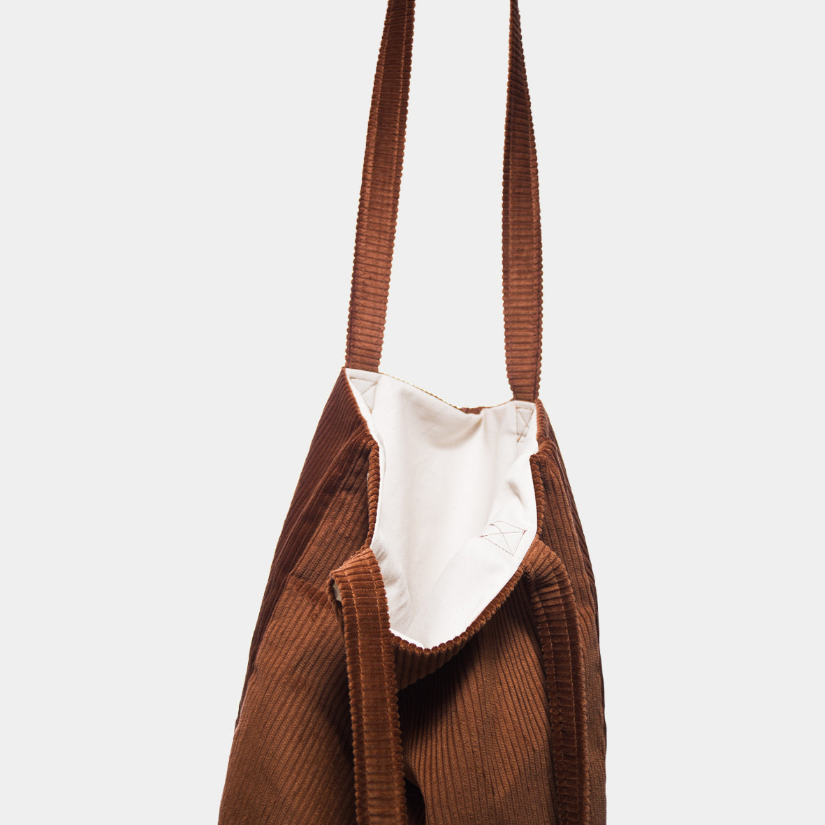 Corduroy tote bag, toffee brown colour with natural colour drill fabric lining. Hand made in New Zealand.