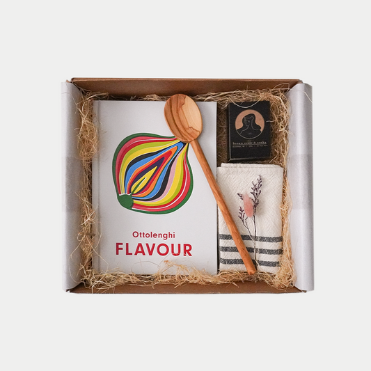 Gift box - Ottolenghi flavour, olive wood oval spoon, Nōla candle - brown sugar & tonka hand crafted in New Zealand and handwoven cotton tea towl